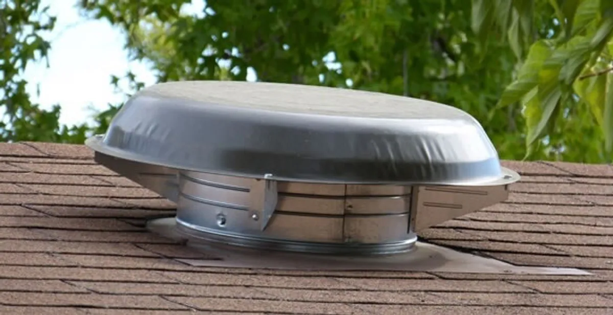 attic fan installation services with low-profile roof ventilation unit in Spokane, WA